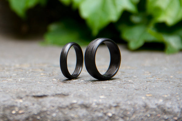 Set of two carbon fiber round wedding bands. Unique and modern black rings. (00103) - Rosler Rings