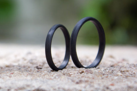 Set of two carbon fiber round wedding bands. Unique and modern black rings. (00145) - Rosler Rings